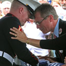 Marine Presents the Flag to the Family