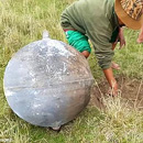 Photo: Mystery as three giant metal spheres fall from the sky over Peru after massive fireball was spotted